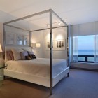 Canopy Bed Frame Cozy Canopy Bed With Metallic Frame In Small Bedroom Stunning Wall Art Glass Bedside Tables Shiny Table Lamp Chic In Chicago Apartments Beautiful Modern Apartment Decorating For A Shabby Chic Look