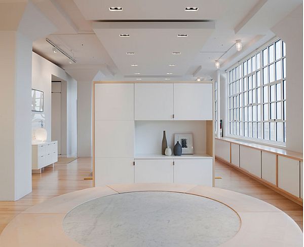 White Painted Inspiration Airy White Painted White Apartment Inspiration For Seating Space Maximized With Round Ottoman And Cabinet Apartments Luminous White Loft With Vibrant Accent Colors In The Middle Of New York City