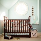 Brown Wooden Bedding Appealing Brown Wooden Boy Crib Bedding With Animal Patterned Bedspread Completed By Crate Styled Storage Kids Room Vivacious Boys Crib Bedding Sets Applied In Modern Vintage Interior