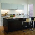 Modern Kitchen On Appealing Modern Kitchen Design Installed On Wooden Glossy Floor Involved Iron Stools And Silver Black Refrigerator Kitchens Fascinating Kitchen Decoration That Transform The Home Into Modern Design