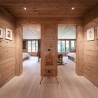 Chalet Gstaad Architectes Awesome Chalet Gstaad Amaldi Neder Architectes Hall For Two Bedrooms For Guests Decorated With Wall Arts Decoration Eclectic White Chalet Decoration With Wooden Veneer For Walls