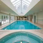 False Ceiling Above Awesome False Ceiling With Glass Above Contemporary Pool Of Indoor Pool House Designs Completed Hole And Lamp Inside Pool Swimming Pool Elegant Indoor Pool House Designs Saving Skins From Sun Burning