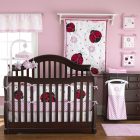 Lady Bug Baby Awesome Lady Bug Themed Pink Baby Girl Nursery Furnished With Brown Wooden Mini Crib Bedding With Floral Splash Kids Room Astonishing Mini Crib Bedding Designed In Minimalist Model For Mansion