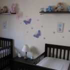 Butterflies Attached Painted Beautiful Butterflies Attached On Cream Painted Nursery Interior With Black Painted Best Cribs Covered By White Linen Kids Room Chic Best Cribs Of Classic Chalet Designed In Vintage Decoration