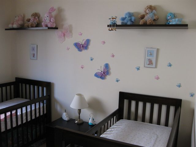 Butterflies Attached Painted Beautiful Butterflies Attached On Cream Painted Nursery Interior With Black Painted Best Cribs Covered By White Linen Kids Room Chic Best Cribs Of Classic Chalet Designed In Vintage Decoration