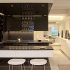 Home Bar Racks Black Home Bar With Glass Racks And Wine Storage In Living Room Space Of Contemporary Apartment With LED Mood Lighting Decoration Perfect Black And White Room Design Combined With LED Lighting