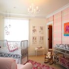 Baby Girl With Bright Baby Girl Nursery Interior With Grey Painted Iron Baby Crib Sets Coupled With Mirrored Dresser For Fashion Kids Room Classy Baby Crib Sets For Contemporary And Eclectic Interior Design