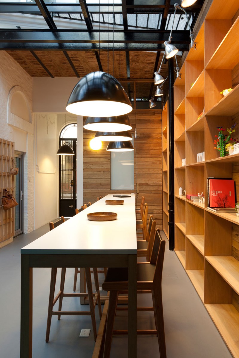 Black Lamps Animal Bright Black Lamps In The Animal Music Studio With Long Table And Wooden Stools Beside The Wooden Shelves Decoration Trendy And Fascinating Office Design Of The Animal Music Project