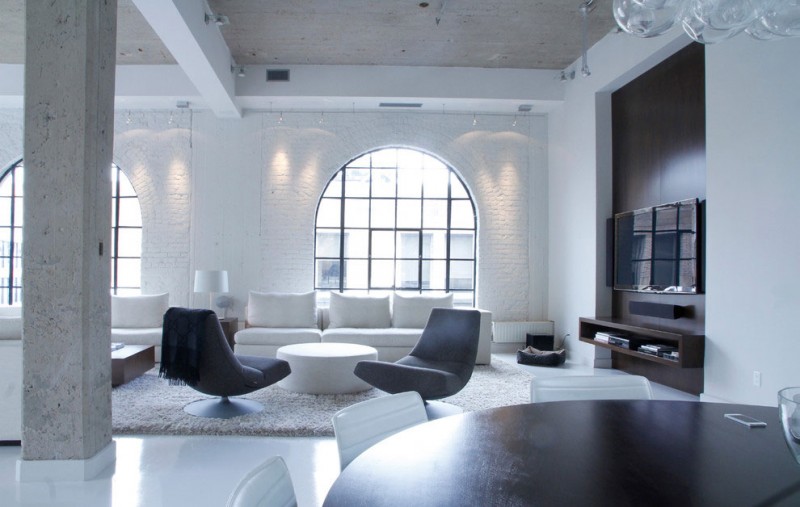 White Painted Penthouse Bright White Painted Chic Montreal Penthouse TV And Dining Room Furnished With White And Black Painted Furnishing Decoration Modest Home Decor And Modern Furniture Of Monochromatic Themes