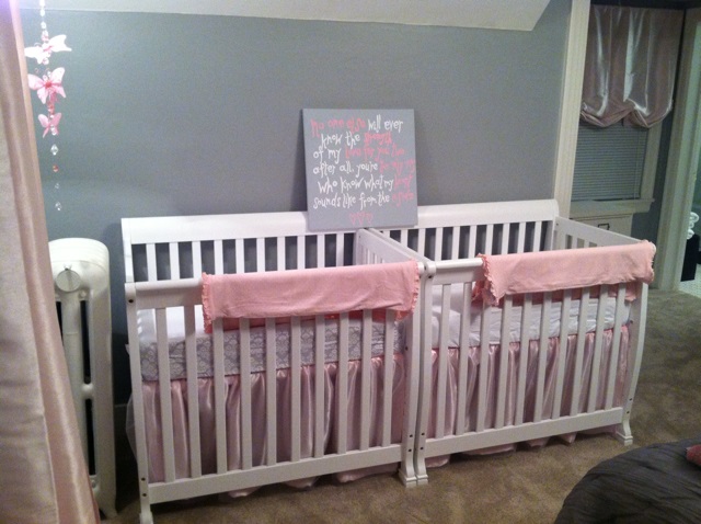 Pink And Cribs Calm Pink And White Mini Cribs Placed Closely To The Light Grey Wall With Quotes Board As Decoration Idea Kids Room Minimalist Mini Cribs In Various Room Designs