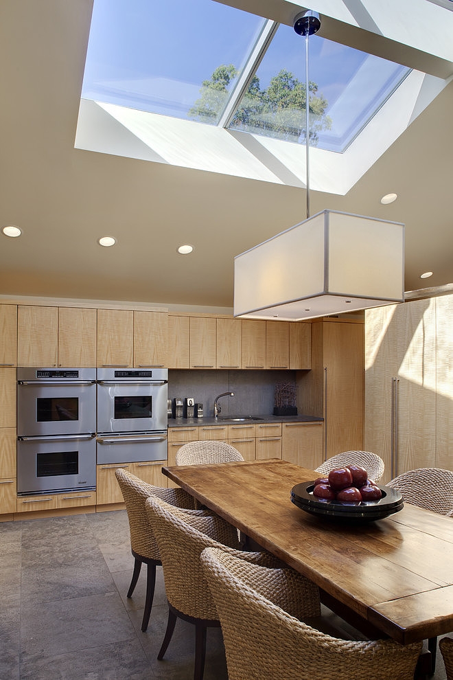 Kitchen Design Kitchen Charming Kitchen Design With Wooden Kitchen Table And Rattan Chairs At Glencoe Residence Lightened By Skylight Window Kitchens Lovely Steel Kitchen With Photo Frames And Flower Decorations