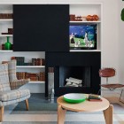 White And Displaying Chic White And Black Cabinets Displaying Colorful Stuffs To Beautify White Apartment Inspiration Seating Space Apartments Luminous White Loft With Vibrant Accent Colors In The Middle Of New York City