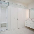 White Apartment Master Clean White Apartment Inspiration For Master Bathroom Enhanced With Glass Shower Solid Built In Wall Wardrobe Apartments Luminous White Loft With Vibrant Accent Colors In The Middle Of New York City