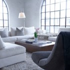White Painted Penthouse Comfortable White Painted Chic Montreal Penthouse Family Room Interior Featured With Classic Arch Framed Windows Decoration Modest Home Decor And Modern Furniture Of Monochromatic Themes