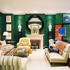 Green Living Colorful Cozy Green Living Room With Colorful Sofas And Brown Table Near The Brick Fireplace Beside The Green Wall Decoration Shining Room Painting Ideas With Jewel Vibrant Colors