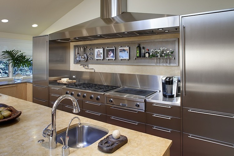 Metal Kitchen At Elegant Metal Kitchen Cabinet Design At Glencoe Residence With Metal Backsplash And Countertop Too Also Range Hood Kitchens Lovely Steel Kitchen With Photo Frames And Flower Decorations
