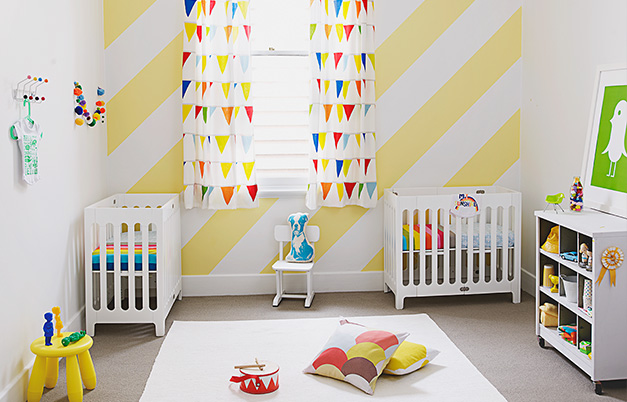 Catching Diagonal White Eye Catching Diagonal Yellow And White Striped Patterned Covering The Center Wall Of Nursery With Best Baby Cribs Kids Room Marvelous Best Baby Cribs Designed In Twins Model For Small Room