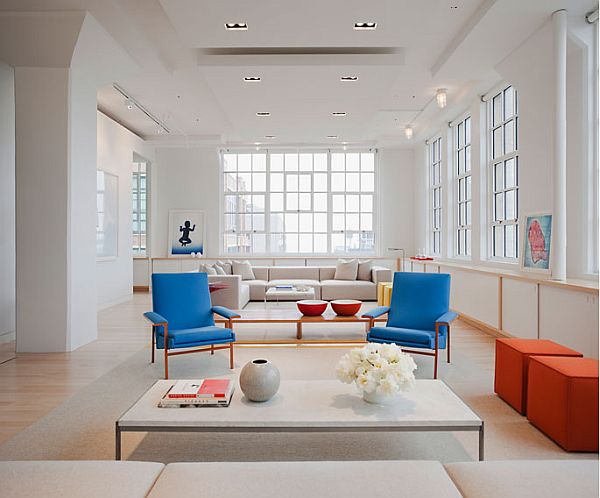 Catching Blue Orange Eye Catching Blue Colored Chairs Orange Stools And White Coffee Table To Enhance White Apartment Inspiration Apartments Luminous White Loft With Vibrant Accent Colors In The Middle Of New York City