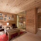 Catching Glass In Eye Catching Glass Wine Cellar In Chalet Gstaad Amaldi Neder Architectes Corner With Seating Space Idea Decoration Eclectic White Chalet Decoration With Wooden Veneer For Walls