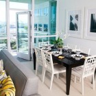 Dining Room Dwellatvue Fabulous Dining Room In The Dwellatvue Apartment With Long Black Table And White Chairs Near Wide Glass Walls Decoration Amazing Elegant Dwelling For Fantastic Modern Home Tour