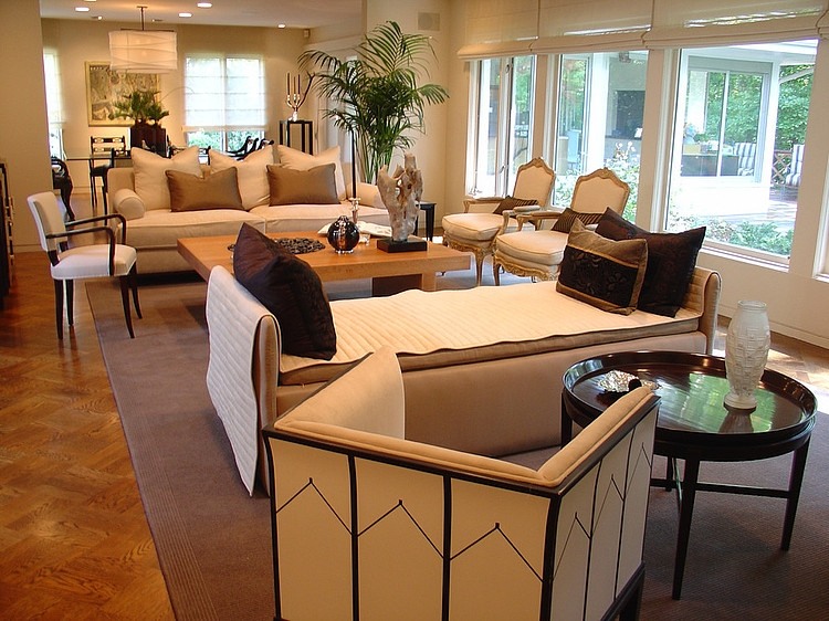 Living Room The Fabulous Living Room Design Inside The Glencoe Residence With Circular Table And Brown Chaise Also Black Sofa Pillows Decoration Lovely Steel Kitchen With Photo Frames And Flower Decorations