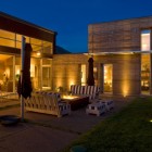 Wooden Sofas Ottoman Fantastic Wooden Sofas And Wooden Ottoman In The Lord Residence Patio With An Interesting Fire Pit Architecture Unique Pond House Design For Your Private Relaxing Place