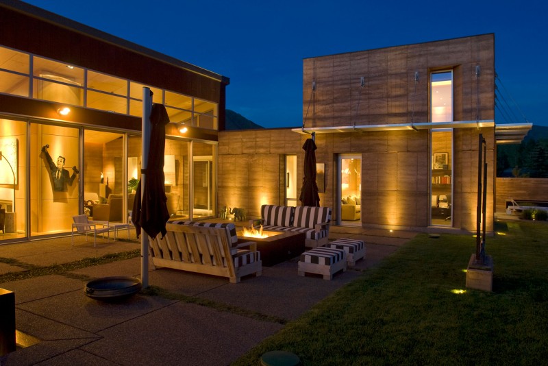 Wooden Sofas Ottoman Fantastic Wooden Sofas And Wooden Ottoman In The Lord Residence Patio With An Interesting Fire Pit Architecture Unique Pond House Design For Your Private Relaxing Place