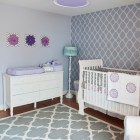 Purple Themed Ideas Feminine Purple Themed Nursery Decor Ideas Involving White Changing Dresser And Crib With Skirted Chair Idea Decoration Lovely Nursery Decor Ideas With Secured Bedroom Appliances