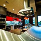 Themes Of Design Glossy Themes Of Modern Kitchen Design Installed On Kitchen Island And Extractor Also Refrigerator On Black Wall Kitchens Fascinating Kitchen Decoration That Transform The Home Into Modern Design
