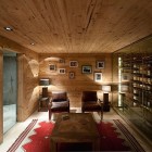 Chalet Gstaad Architectes Gorgeous Chalet Gstaad Amaldi Neder Architectes Seating Space Involving Leather Chairs And Wooden Table Decoration Eclectic White Chalet Decoration With Wooden Veneer For Walls