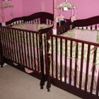 Pink Painted Nursery Gorgeous Pink Painted Baby Girl Nursery Interior With Brown Wooden Best Cribs Covered By Pink Linen Idea Kids Room Chic Best Cribs Of Classic Chalet Designed In Vintage Decoration