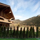 Chalet Gstaad Architectes Incredible Chalet Gstaad Amaldi Neder Architectes Building Displaying Natural Landscaping Design With Trees Decoration Eclectic White Chalet Decoration With Wooden Veneer For Walls