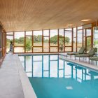 Modern Pool Pool Inspiring Modern Pool With Indoor Pool House Designs Surrounded By Wooden Glass Windows Furnished With Steel Lounge Swimming Pool Elegant Indoor Pool House Designs Saving Skins From Sun Burning