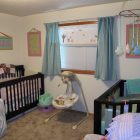 White Painted With Ordinary White Painted Nursery Interior With Black Painted Best Baby Cribs For Twins With Blue Pink And Green Splash Kids Room Marvelous Best Baby Cribs Designed In Twins Model For Small Room