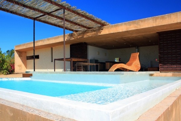 Swimming Pool Turquoise Overflowed Swimming Pool Water In Turquoise Color Giving Fresh Accent Into House Exterior Of Lovely Santos Dream Homes  Stunning Holiday Home With Exquisite Concrete Pools