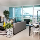 Living Room Room Sensational Living Room And Dining Room In Dwellatvue Apartment With Grey Sofas And Black Table Under White Ceiling Decoration Amazing Elegant Dwelling For Fantastic Modern Home Tour