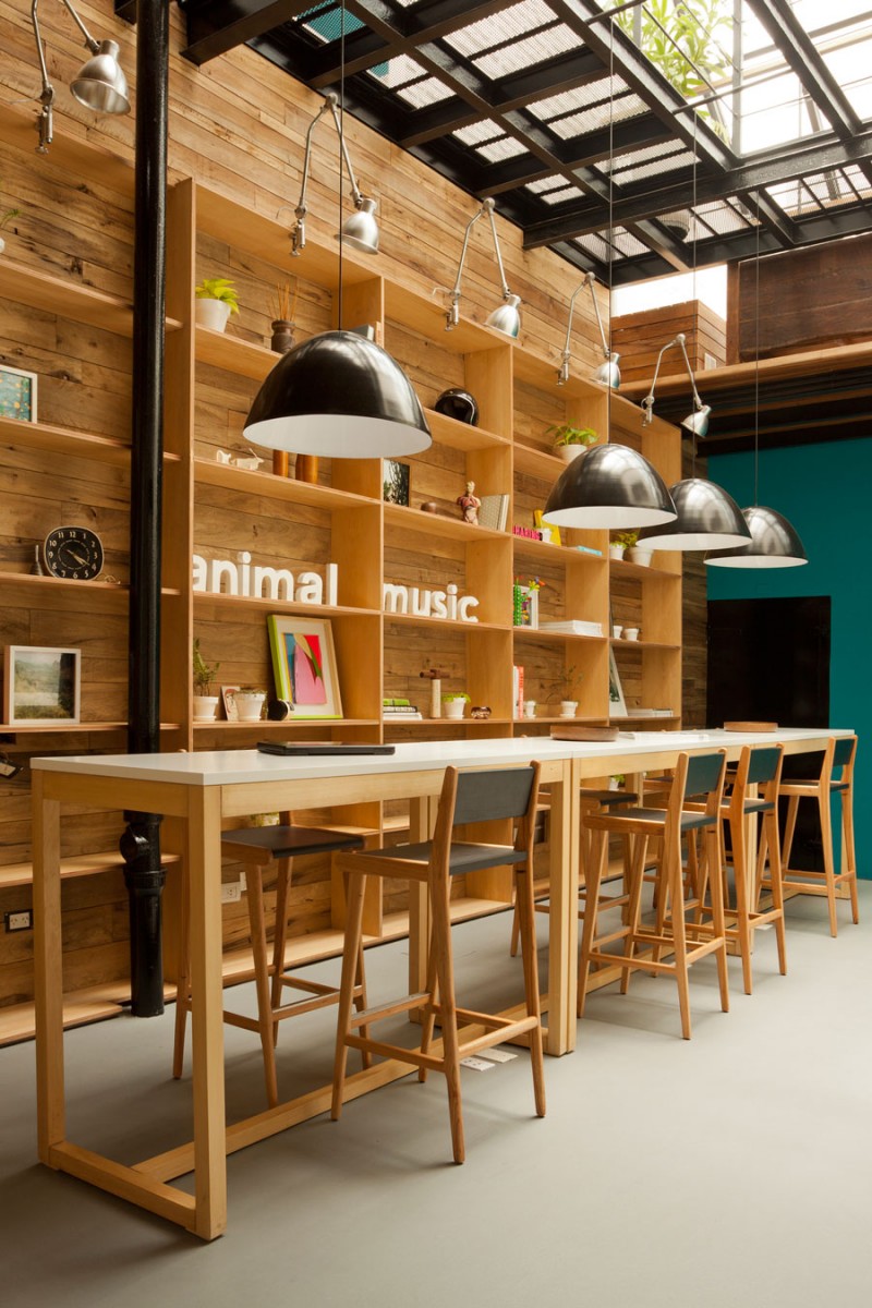 Wooden Stools Table Sensational Wooden Stools And Wooden Table In The Animal Music Studio With Some Black Curve Lamps Decoration Trendy And Fascinating Office Design Of The Animal Music Project