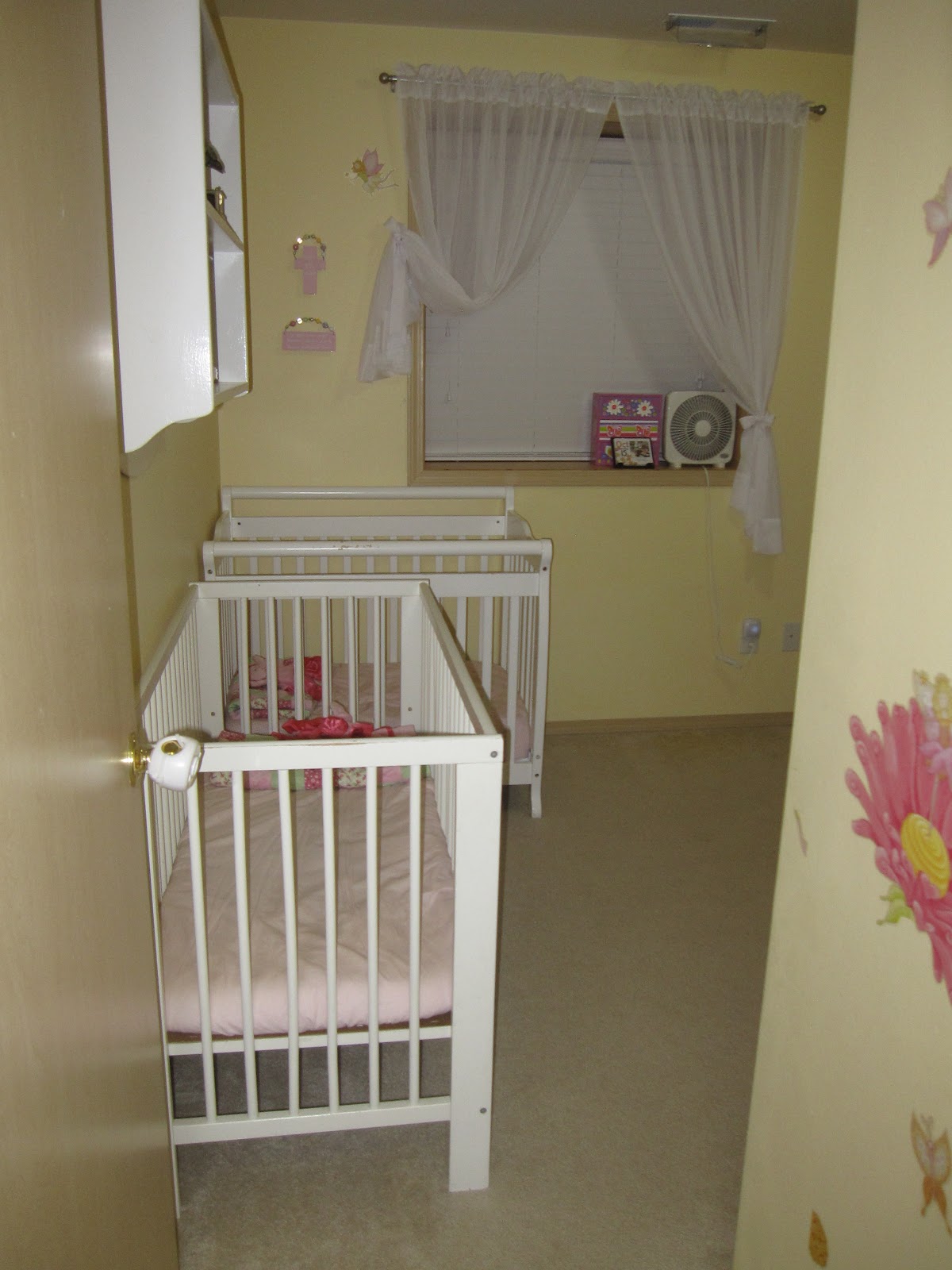 White Painted Baby Simple White Painted Wooden Best Baby Cribs Placed Inside Bright Cream Painted Nursery Room With Pink Splash Kids Room  Marvelous Best Baby Cribs Designed In Twins Model For Small Room