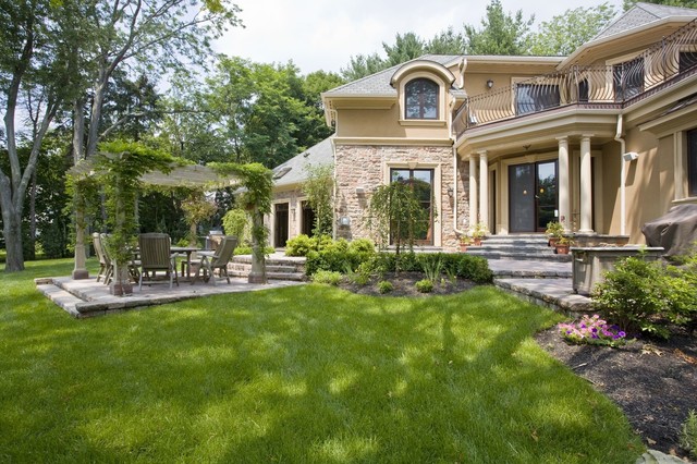 Backyard With Plants Spacious Backyard With Colorful Ornamental Plants Patio Pergola Natural Ivy Rustic Wood Chairs And Table Outdoor Roaster Outdoor  Elegant Terrace With Natural Patio Pergola For The Modern Homes