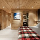 Chalet Gstaad Architectes Spacious Chalet Gstaad Amaldi Neder Architectes Master Bedroom With Smart Wooden Furniture And Bathroom Decoration Eclectic White Chalet Decoration With Wooden Veneer For Walls