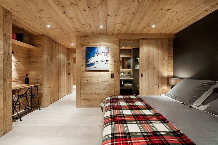 Chalet Gstaad Architectes Spacious Chalet Gstaad Amaldi Neder Architectes Master Bedroom With Smart Wooden Furniture And Bathroom Decoration Eclectic White Chalet Decoration With Wooden Veneer For Walls