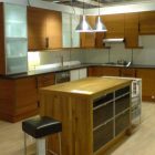 Kitchen Cupboard Two Striking Kitchen Cupboard Design With Two Pendant Lamps In Modern Stylish Touch And Used Glass Door Cabinet Furniture Kitchens Stylish Kitchen Cupboards Design For Minimalist Kitchen Appearance