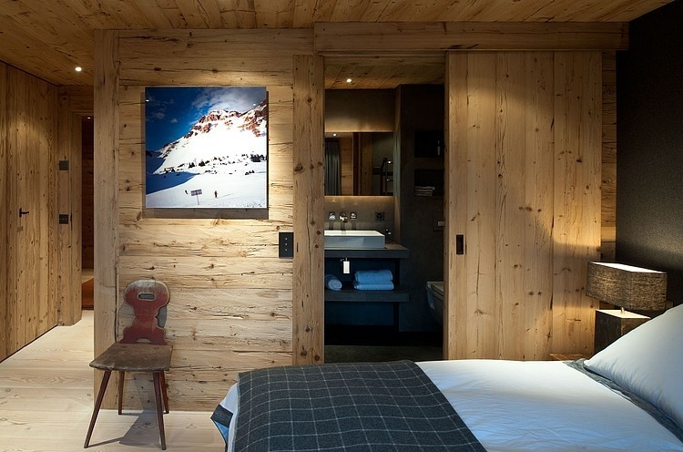 Alps Painting Wooden Stunning Alps Painting Studded On Wooden Wall Of Chalet Gstaad Amaldi Neder Architectes Bedroom With Bath Decoration  Eclectic White Chalet Decoration With Wooden Veneer For Walls