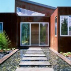 Stone Pathway Pebble Stunning Stone Pathway On The Pebble Pool Outside The Lord Residence With Brown Wall And Glass Windows Architecture Unique Pond House Design For Your Private Relaxing Place