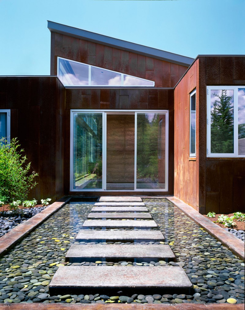 Stone Pathway Pebble Stunning Stone Pathway On The Pebble Pool Outside The Lord Residence With Brown Wall And Glass Windows Architecture Unique Pond House Design For Your Private Relaxing Place