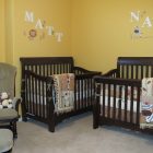 Yellow Painted For Stunning Yellow Painted Baby Nursery For Twin Furnished With Dark Brown Wooden Mini Cribs With Lounge Kids Room Minimalist Mini Cribs In Various Room Designs