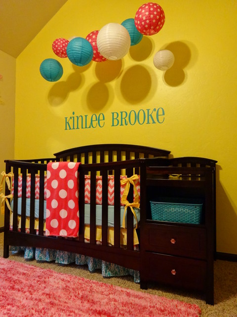 Yellow Painted Ideas Surprising Yellow Painted Nursery Decor Ideas With Turquoise Name On Center Wall Above Black Painted Crib With Storage Decoration  Lovely Nursery Decor Ideas With Secured Bedroom Appliances