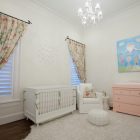 Home Nursery In Traditional Home Nursery Idea Painted In White With White Crib Mixed With Pink Dresser And White Skirted Chair Kids Room Lavish White Crib Designed In Contemporary Style For Main Furniture