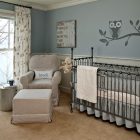 Black Iron Sets Transitional Black Iron Baby Crib Sets Covered By Grey Skirt To Match Grey Wall With Funny Owl And Branch Decal Kids Room Classy Baby Crib Sets For Contemporary And Eclectic Interior Design