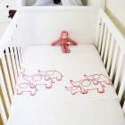 White Crib Decorated Unique White Crib Sheet Idea Decorated With Funny Pink Animal Pictures To Match Small Monkey Doll On It Kids Room Astonishing Crib Sheet For Baby In Small Minimalist Room